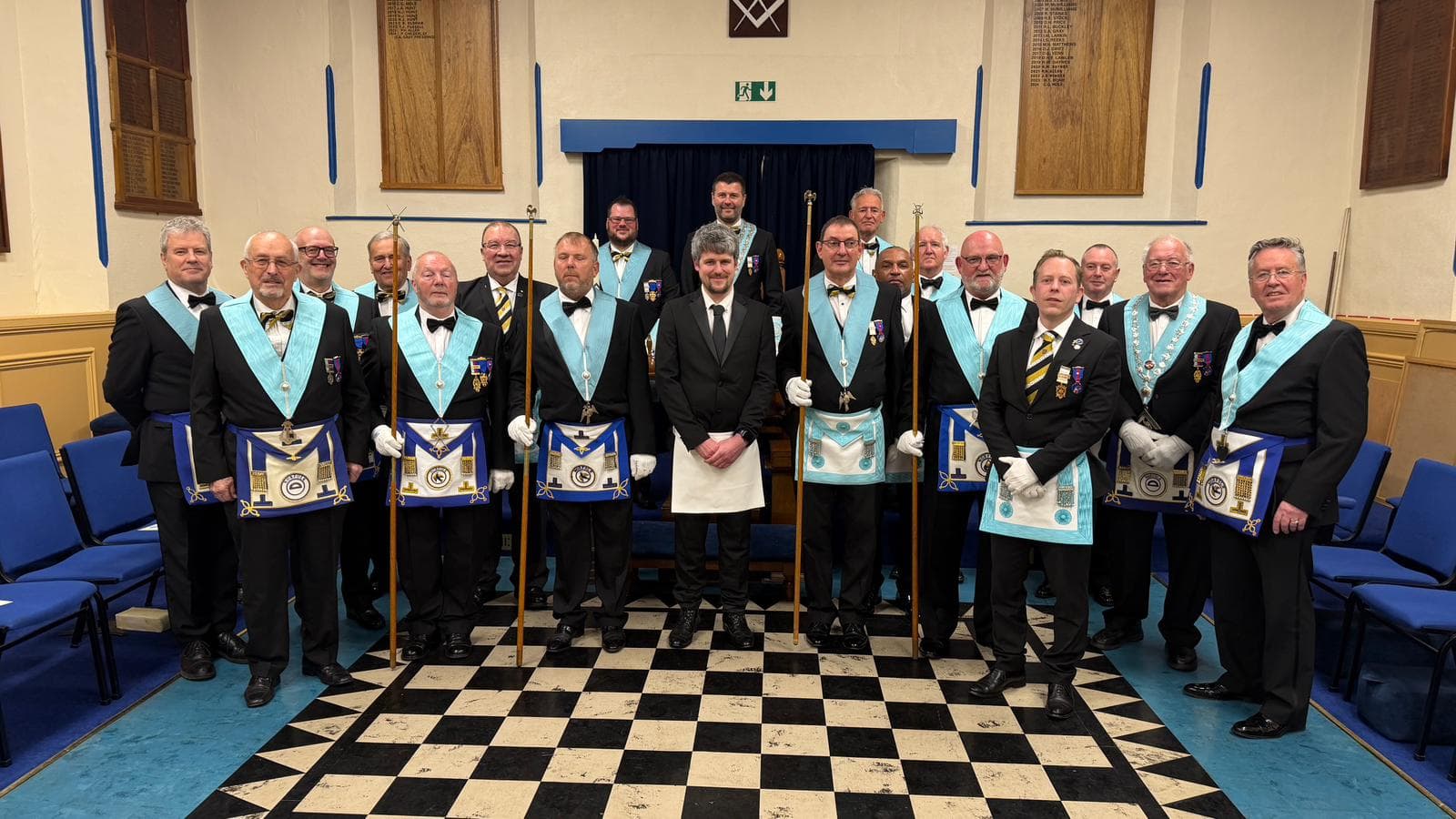 St Winnold Lodge members in regalia in the lodge room